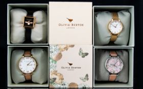 Olivia Burton Collection of Boxed Unopened Ladies Watches four in total, with papers, booklets etc.