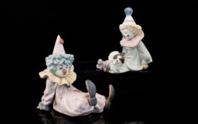 Lladro Porcelain Figurines ( 2 ) Two In Total. Comprises 1/ Pierrot with Puppy Dog.