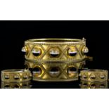 Scottish 19th Century Gilt Metal Banded Agate Set Aesthetic Hinged Bangle with Safety Chain.