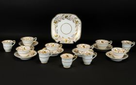 Part Tea Set (18) pieces in total. To include sandwich plate, 6 cups and saucers and 5 small