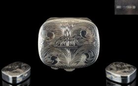 Elizabeth II Silver Hinged Pill Box with Chased Stylised Floral Decoration to Cover.