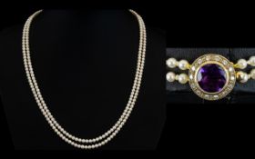 Ladies - Very Nice Quality Double Strand Pearl Necklace with Superb Amethyst and Diamond Clasp.