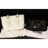 Two Designer Handbags, one Black Moschino, one cream The Bridge and both with original dust bags.