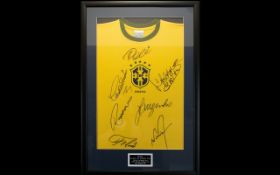 Brazil 1970 World Cup Winners Signed Shirt A well presented Brazil shirt framed and signed by Carlos