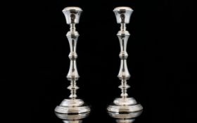 Pair of Corinthian Style Silver Plated Candlesticks 12 inches in height.