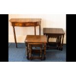 A Small Console Table Serpentine front, with two frieze drawers raised on reeded column legs.