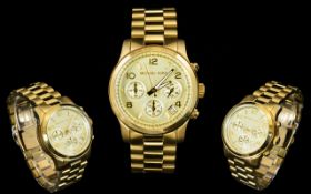 Michael Kors Unisex Jet Set Sport Rose Tone Gold Plated Chronograph Watch.