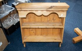 A Pitched Country Style Pine Kitchen Wall Unit height 70 cms, width 60 cms and depth 20 cms.