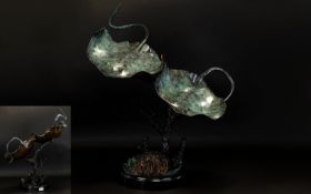 A Large Cold Painted Bronze In The Form Of A Pair Of Stingray Raised on circular black marble