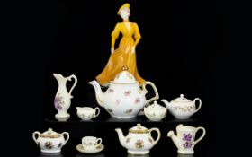 A Small Collection Of Mixed Ceramics A varied lot to include Coalport figurine in the form of an