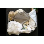 A Collection of Assorted Linen including lace doilies, table cloths,