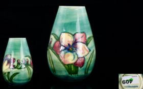 Moorcroft Tube lined Tapered Ovoid Shaped Small Vase ' Freesia ' Design on Bluey - Green Ground,