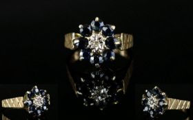 Ladies - 1970's 9ct Yellow Gold Sapphire and Diamond Set Dress Ring. Flower head Design.