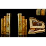 A Set Of Decorative Bookends Two matching carved wood bookends in the form of a stack of books,