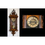 A Late 19th Century Walnut Cased Vienna Wall Clock Cream chapter ring with Roman numerals,