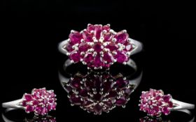 Ladies - Contemporary Design Silver Cluster Ring, Set with Rubies. The Rubies of Good Colour and