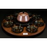 A 1970's Rotating Fondue Set Comprising circular rotating wooden tray complete with original