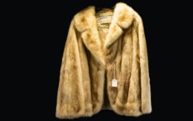 A Vintage Blonde Mink Jacket Hip length evening jacket with revere collar, front slant pockets,