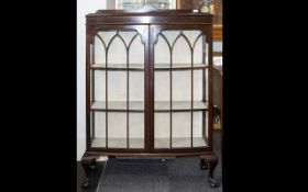 A Mahogany Glazed Display Cabinet Astral Glazed Cabinet of Typical Form with Claw & Ball Feet and