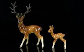 Ceramic Stag Figure And Accompanying Faun West German ceramic figures, each marked to underside.