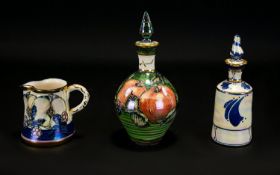 Alvin F Irving Lancaster Studio Art Pottery A Collection Of Three Lustreware Ceramic Items Each hand