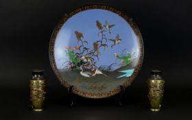 Mid 20th Century Japanese Cloisonne Wall Plate Depicting mallards in flight on mossy bank with