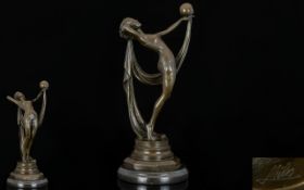 A Reproduction Art Deco Bronze Figure Raised on circular black marble plinth in the form of an