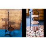 A Collection of Antique Cake Stands and Occasional Table.