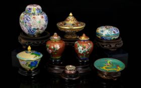 A Collection Of Twentieth Century Oriental Cloisonne Items Eight in total, each with carved and