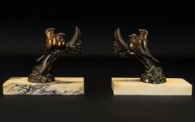 Art Deco Reproduction Bronzed Metal And Marble Bookends A pair of bookends raised on rectangular