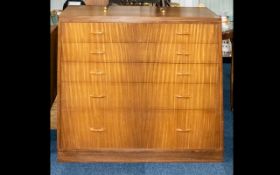 A Mid Century Teak Chest Of Drawers Designed By Peter Hayard. Comprising five long graduating