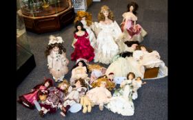 A Large Collection Of Porcelain And Collectible Dolls A large box containing approx 15 dolls of