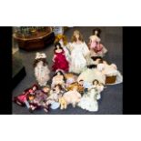 A Large Collection Of Porcelain And Collectible Dolls A large box containing approx 15 dolls of