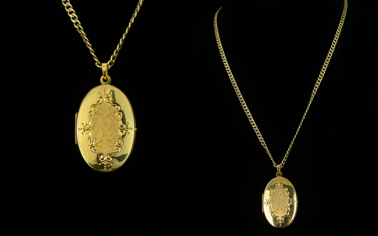 Contemporary Designed Oval Shaped 9ct Gold Hinged Locket,