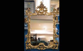 A Large Italian Style Gilt Framed Mirror Rococo style mirror;