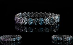 Shades of Blue Topaz and Purple Amethyst Bracelet, a 14.