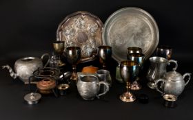 A Mixed Collection Of Pewter And Metalware A large mixed box containing several goblets,