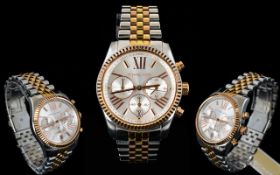 Michael Kors Stainless Steel Fashion Watch MK 5735 Stainless steel and rose gold tone chronograph.