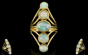 Opal Kite Shape Statement Ring, five bezel set opals, the largest to the centre being a 1.