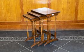 Nest Of Three Edwardian Walnut Tables Spindle supports, rectangular tops, height 23 inches,