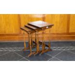 Nest Of Three Edwardian Walnut Tables Spindle supports, rectangular tops, height 23 inches,