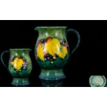 William Moorcroft 1930's Signed Jug ' Leaf and Berries ' Design on Green / Blue Ground with