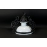 A Traditional Dutch Ceiling Lamp Antique glass lamp with cast metal filigree arms and pulley chain