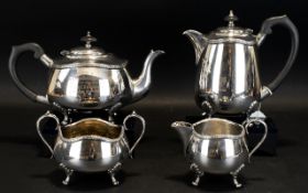 A Silver Plated Tea And Coffee Service Comprising teapot, coffeepot, sugar bowl and milk jug,