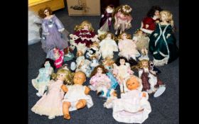 A Large Collection Of Porcelain And Collectible Dolls A large box containing approx 20 dolls of