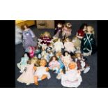 A Large Collection Of Porcelain And Collectible Dolls A large box containing approx 20 dolls of