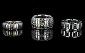 A Collection Of Three Gents Sterling Silver Fashion Rings Each marked to inner shank 925 for silver.