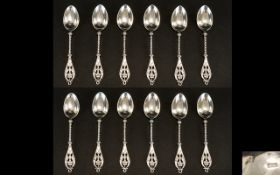 Dutch - Fine Quality Set of 12 Ornate Silver Teaspoons with Rope Twist Stems and Stylised Floral