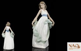 Nao by Lladro Porcelain Figurine - Young Woman ' Walking on Air ' Model 1343. Height 10.