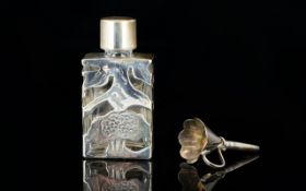 A Silver Overlaid Scent Bottle With Accompanying Funnel Of square form in fitted box.
